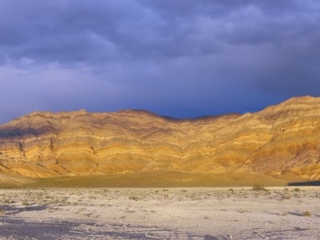 The Last Chance Range at Eureka Dunes in northern Death Valley National Park in a beautiful sunset