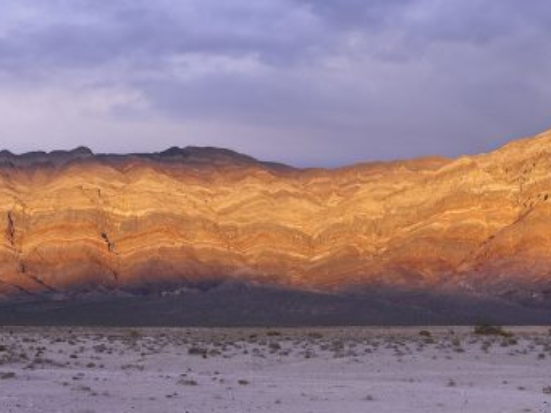 The Last Chance Range at Eureka Dunes in northern Death Valley National Park in a beautiful sunset