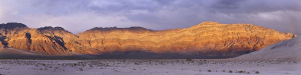 The Last Chance Range at Eureka Dunes in northern Death Valley National Park in a beautiful sunset