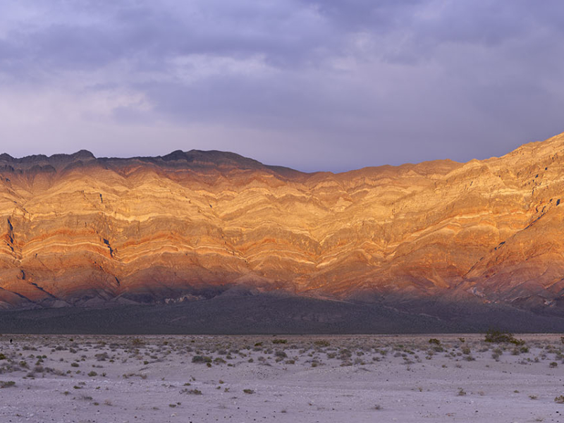 The Last Chance Range at Eureka Dunes in northern Death Valley National Park in a beautiful sunset