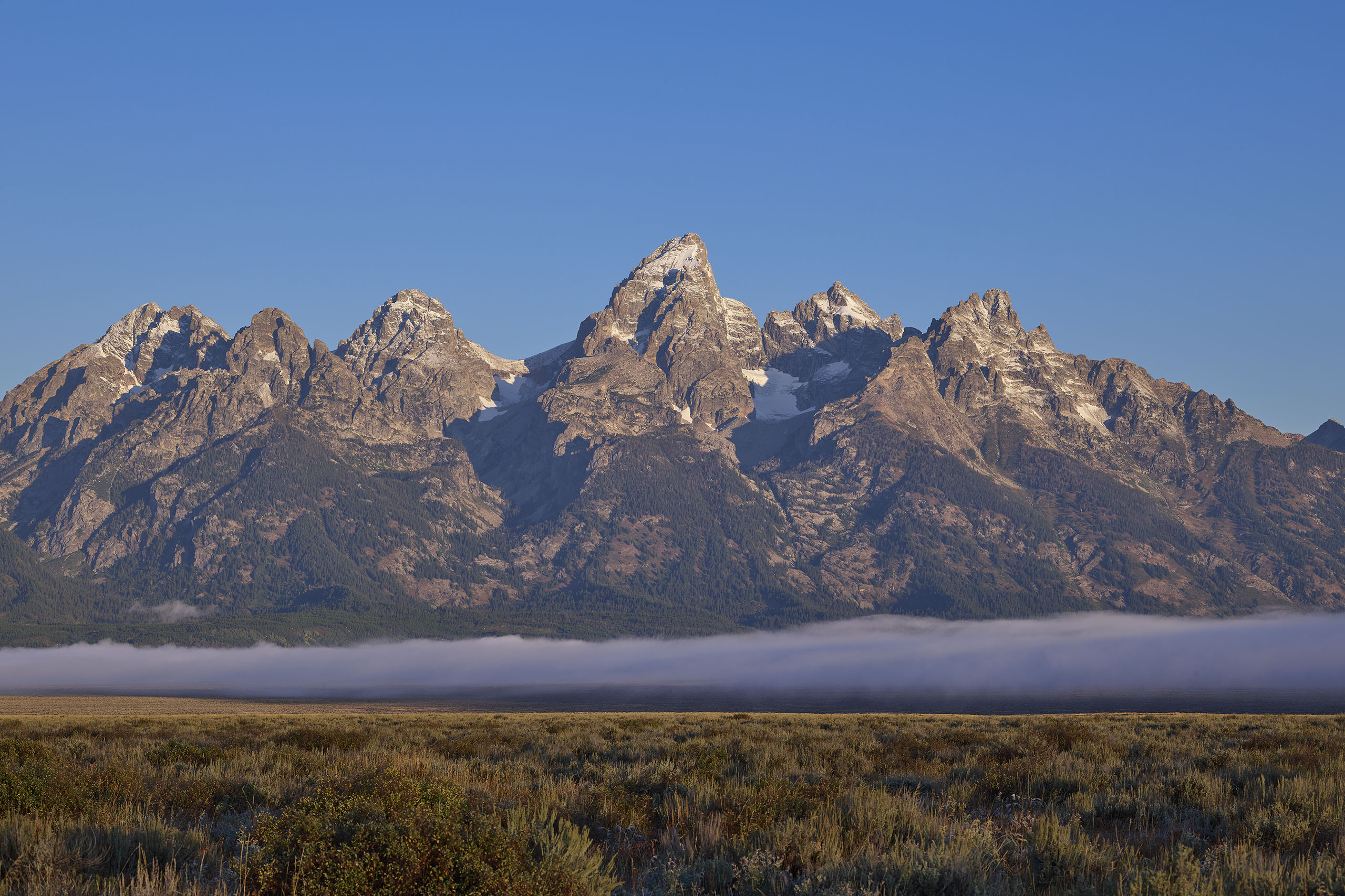 ground fog in the valley Grand Tetons National Park Jackson Hole Wyoming